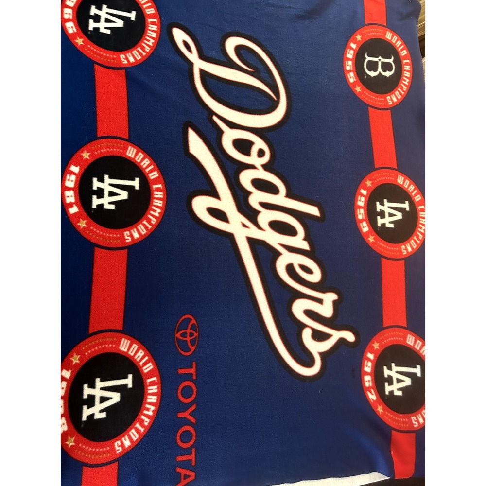 LA Dodgers blanket with logo and list of world series champioships